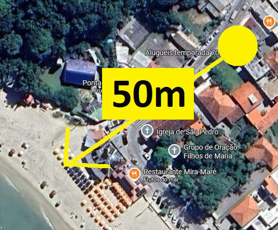 Vista aérea del Edificio 7005 - Playa de Ponta das Canas